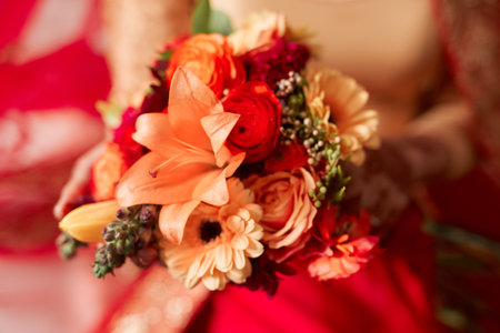 Its not a wedding day without a beautiful bouquet. an unrecognizable woman holding a bunch of flowers before her wedding.の写真素材