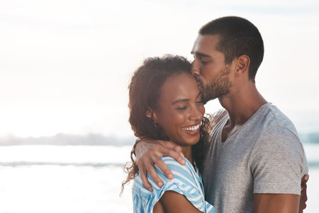 Your love has transformed my world. a young couple enjoying some quality time together at the beach.