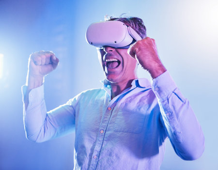 Winner, senior and man with virtual reality glasses celebrating game win with success fist....