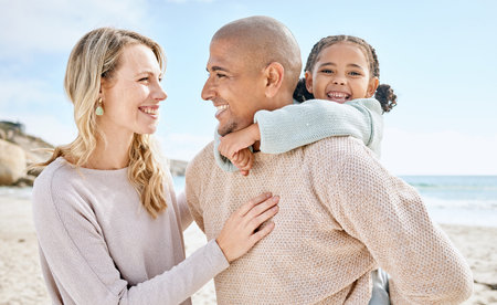 Family beach, child travel and parents happy on holiday by the tropical water on Island in Costa...