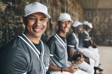 Portrait, team and baseball people smile, happy and sitting in dugout with sports uniform before game, training or match. Men baseball player group smiling before practice with happiness or teamworkの写真素材