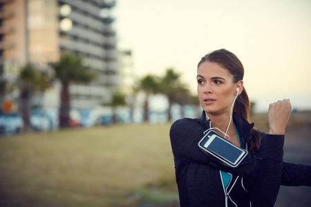 Eyes set firmly on the prize. a sporty young woman exercising outdoors.