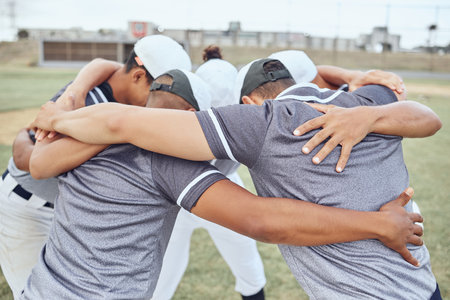 Huddle, baseball teamwork and team on baseball field ready for game, match or competition. Training, exercise and crowd of baseball players together for motivation, team building or winning mindset.の写真素材