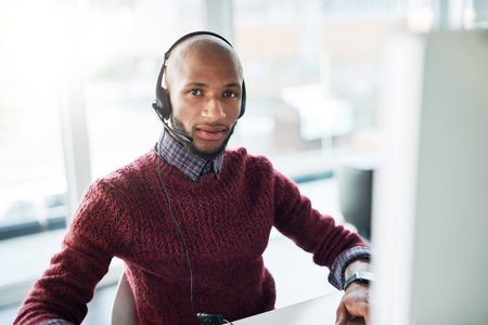Im a problem solver. Cropped portrait of a handsome young male call center agent working in his...