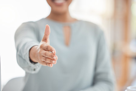 Welcome, meeting or deal handshake of woman for respect, cooperation and greeting at business. Interview, b2b or partnership of professional employee with hand reaching for work agreement.の写真素材