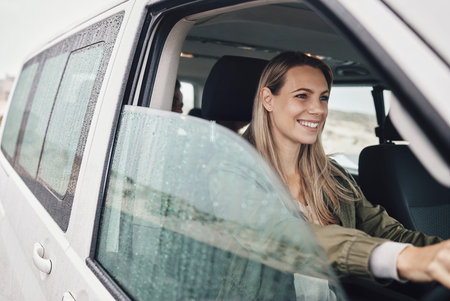 Travel, driver and woman in a modern campervan in Mexico, smile and relax while driving through the...