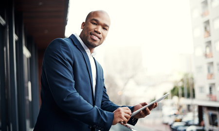 Its the tool that allows me to put ambition into action. Portrait of a handsome young businessman...