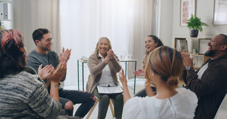 Group, clapping hands and counselling meeting for mental health, laugh and team happy, support and...