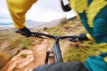 Mountain bike, fast and hands cycling with speed on nature trail for bicycle fitness, race or workout. Bike, action and cyclist man with blur movement and motion on outdoor adventureの写真素材