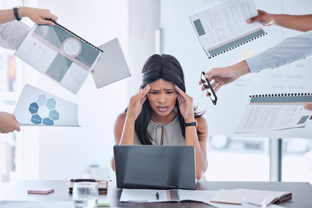 Stress, hands and business woman with headache from multitasking, workload and work pressure in office. Anxiety, hand and black woman suffering with burnout, chaos and deadline at corporate jobの写真素材