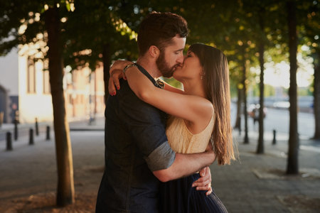 Theyre all about public displays of affection. an affectionate young couple kissing while on a date.