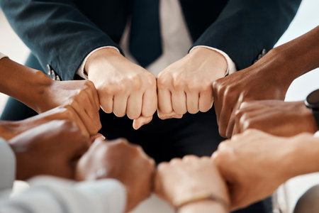 Fist, diversity and solidarity, support and collaboration, team trust and community in workplace....