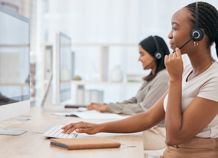 Call center, customer service and business woman consulting on computer in modern office for...