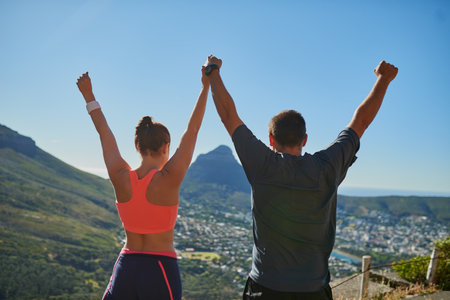 We believe in healthy dating. two people celebrating after a good workout.の写真素材