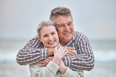 Beach, hug and portrait of senior couple relaxing in Australia with smile, love and happiness on...