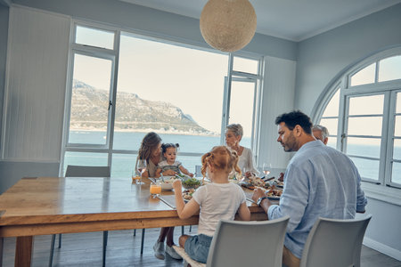 Big family, food and lunch in home dining room with people sharing a healthy meal. Support, love and...