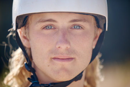 Fitness, cycling and portrait of man with helmet macro for exercise, workout and sport safety. Young biker sports guy ready for outdoor cyclist cardio and wellness for an active lifestyle.の写真素材