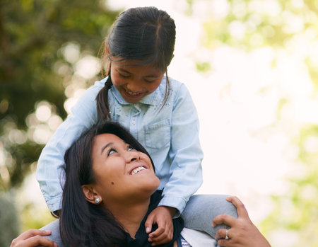 Special moments made together. a mother and daughter enjoying the day outdoors together.の写真素材