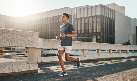Fitness, health and city man running on street with motivation, healthy mindset and summer morning...