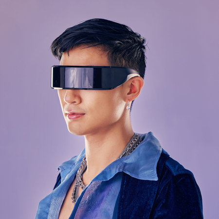 Cyberpunk, fashion and futuristic asian man, jewellery and clothes with cool glasses in purple mockup studio background. Aesthetic, abstract and designer sunglasses on male model with sci fi styleの写真素材