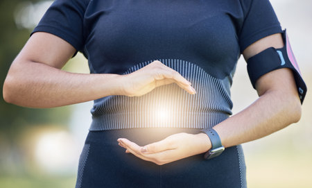 Fitness, health and light hologram in hands to show healthy wellness, workout and sport lifestyle. Calm sports, wellness and training woman outdoor with a projection in hand to show athlete peaceの写真素材
