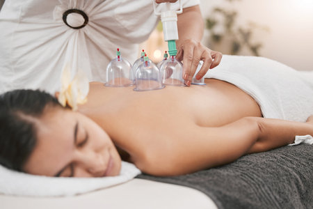 Relax, health and cupping with woman in spa for alternative medicine, healing and physiotherapy....