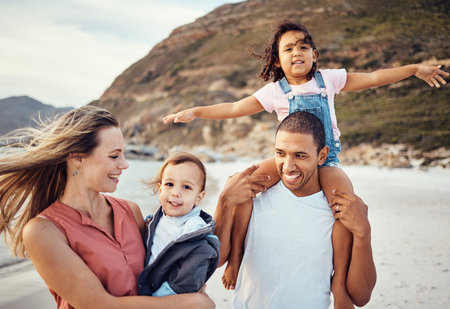 Happy family, beach and kids with parents in nature, fun and bonding while walking along the ocean....