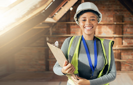 Engineering, checklist and electrician in house basement for inspection, maintenance or electrical services. Technician, smile and happy woman checking pipes for safety or security in home renovationの写真素材
