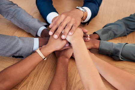 Support, partnership and hands of diversity business people stack together in solidarity, trust and...