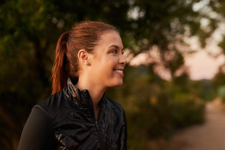 Shes happiest when shes running. an attractive young woman exercising outdoors.