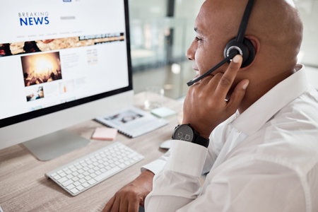 Call center, man and computer with online news advice for customer service communication. Hotline,...