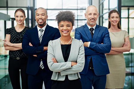 They love what they do and it shows. Cropped portrait of a diverse group of businesspeople standing...
