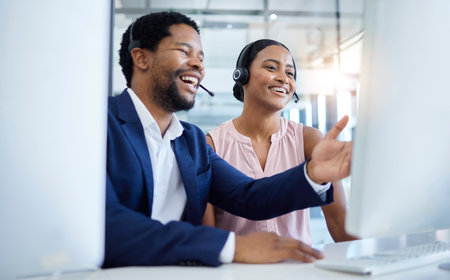 Man, black woman or computer training in call center office, crm consulting startup or b2b telemarketing sales company. Smile, happy or learning intern on consultant tech with contact us mentor helpの写真素材