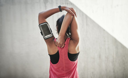 The city is my gym. a young person working out in and around the city.