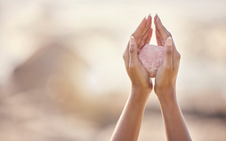Woman, crystal hands and zen outdoor in nature for healing wellness, mindfulness or peace with...