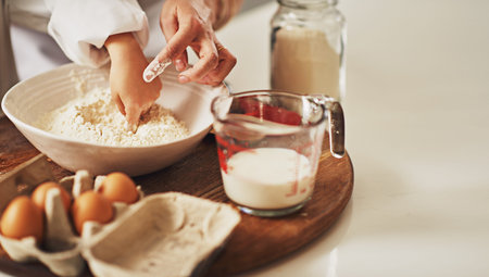 All the freshest ingredients. a mother and her son baking in the kitchen.