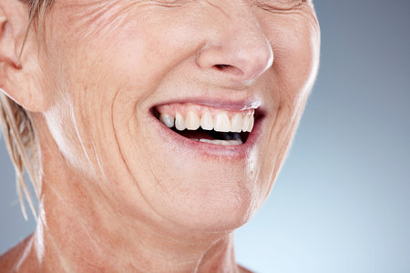 Smile of senior woman with dental teeth care, oral hygiene and happy with luxury self care...