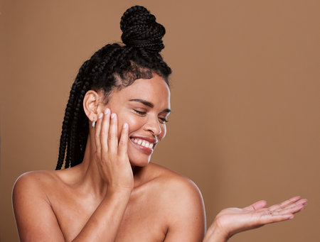 Beauty, skincare and black woman mock up happy about facial wellness, cosmetic health and hands, Woman model with happiness of cosmetics, hair care and dark skin luxury dermatology product placementの写真素材