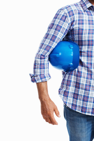 Handsome architect holding blue protective helmet. Closeup of handsome architect holding blue...