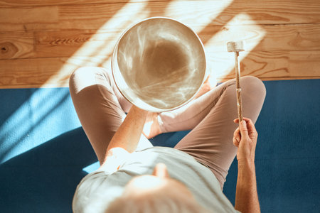 Yoga, wellness and meditation sound therapy of a senior woman doing zen, spiritual and calm workout....