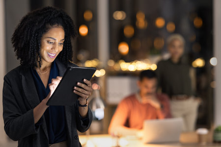 Night business, black woman and tablet planning, research and online information, web app and...