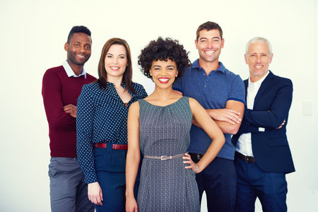 Were the team you need. Cropped portrait of a group of businesspeople standing in the studio.