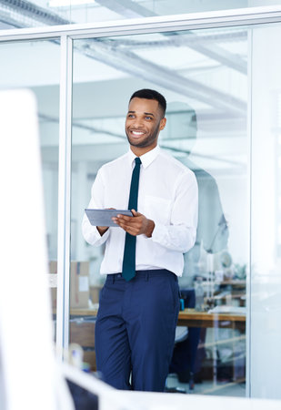 I should email the client for a follow up...A handsome young african american businessman using his...