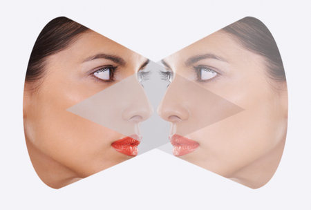 Reflection of perfection. a beautiful young woman through a cut out shape.
