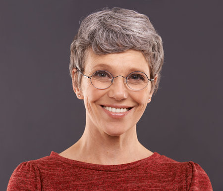 I believe in happiness at first sight. Studio portrait of a happy elderly woman wearing glasses...