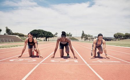 Marathon, ready and sports women group or runner at a stadium race track for competition, game and...