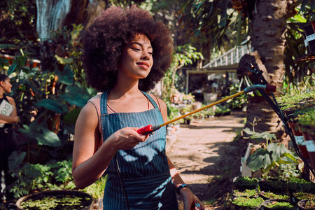 Black woman, plant pesticide and nature garden for sustainable gardening, farming and a healthy...