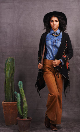 Last of the mohicans. Studio portrait of a beautiful young ethnic woman wearing a Mexican-style...