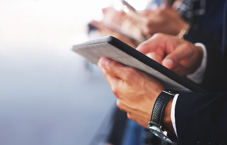 Hands, corporate or business people with tablet for communication, planning or networking strategy in conference. Teamwork, business meeting or hand with technology for innovation, vision or missionの写真素材