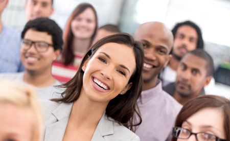Loving the positive workplace. a group of positive businesspeople.